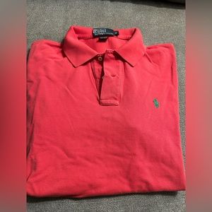 Men’s Polo by Ralph Lauren polo shirt in a light red color, size medium.